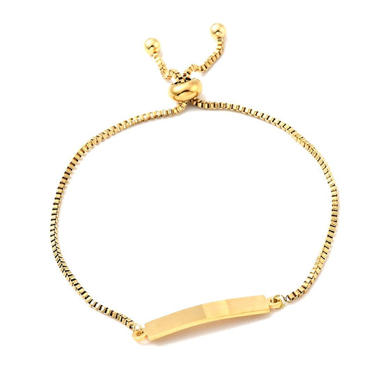Gold-colored stainless steel curb bracelet with engravable plate