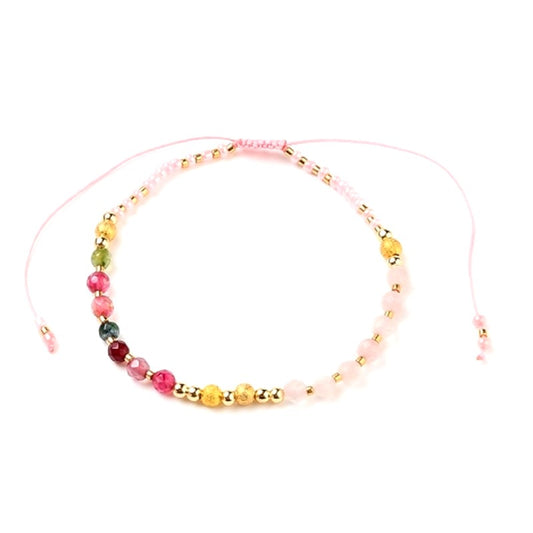 Bracelet souple perles rocaille rose et or sur fil nylon