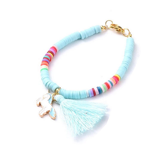 Copy of sky blue polymer child bracelet with pompom and unicorn