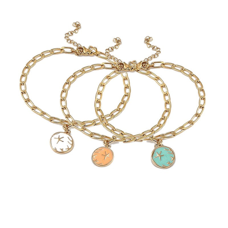 Set of 5 stainless steel bracelets with enamel charm