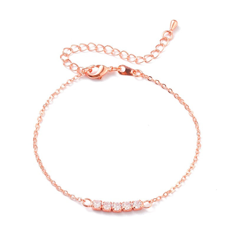 Pulsera flexible de oro rosa con diamantes y circonitas