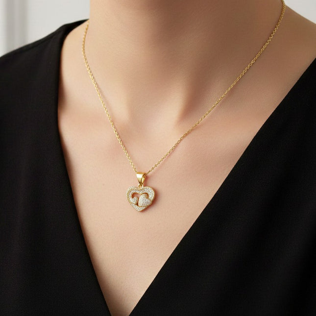 Collier pour femme chaîne ornée d'un joli pendentif 3 cœurs serti de zirconiums Colliers plaqué or Bijouxmode