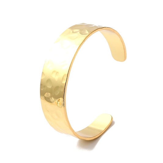 Gold cuff bracelet for women with hammered effect