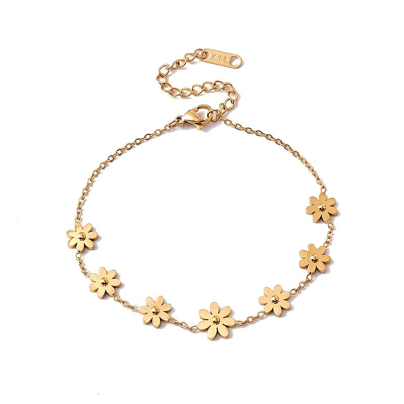 Stainless steel bracelet 7 gold flowers