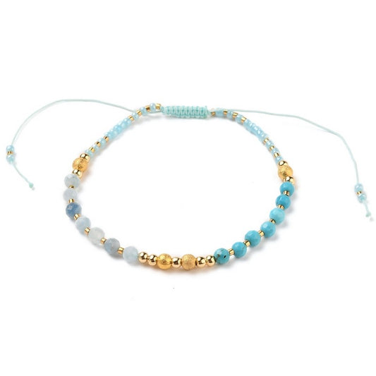 Bracelet souple perles rocaille bleu et or sur fil nylon
