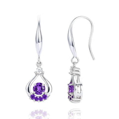 Boucles d'oreilles argent 925 tombantes zirconium mauve serti Sharifa