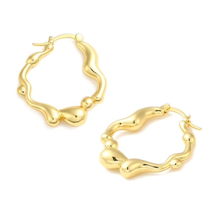 Boucles d'oreilles Créoles dorées à l'or fin