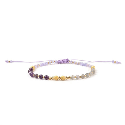 Bracelet souple perles rocaille mauve et or sur fil nylon Bracelets plaqué or Bijouxmode