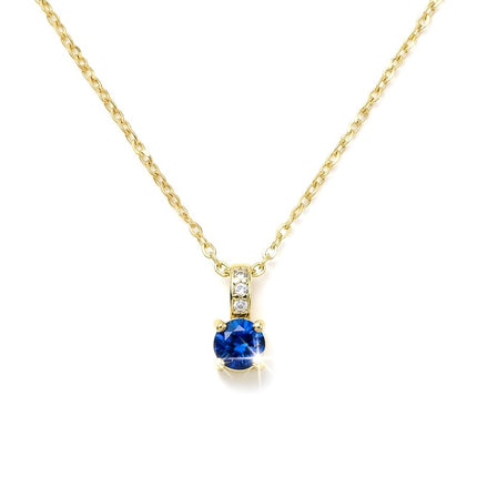 Collier chaîne et pendentif oxyde bleu nuit et zirconiums sertis sur la bélière doré à l'or fin