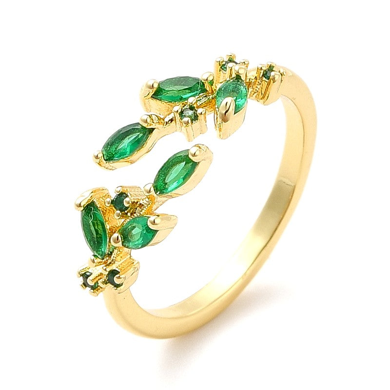 Adjustable women's ring with green zirconiums