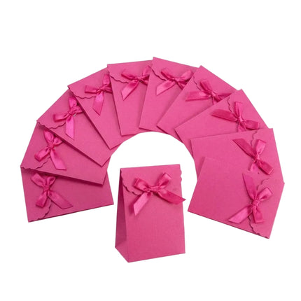 Lot de 12 petits sacs pochettes cadeaux fushia 10*8*3 cm