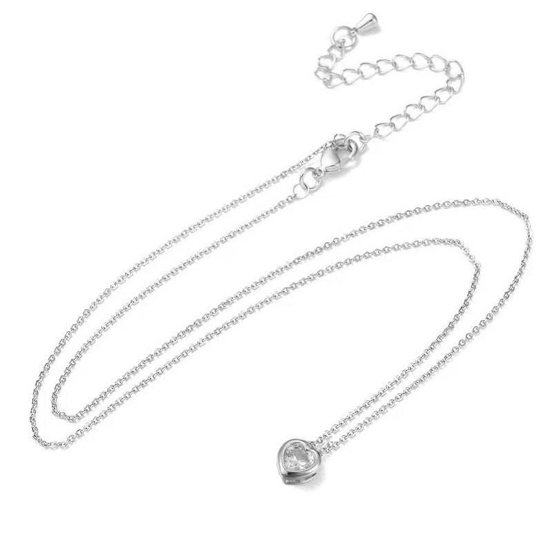 Collier argenté chaîne et pendentif cœur zirconiums blanc