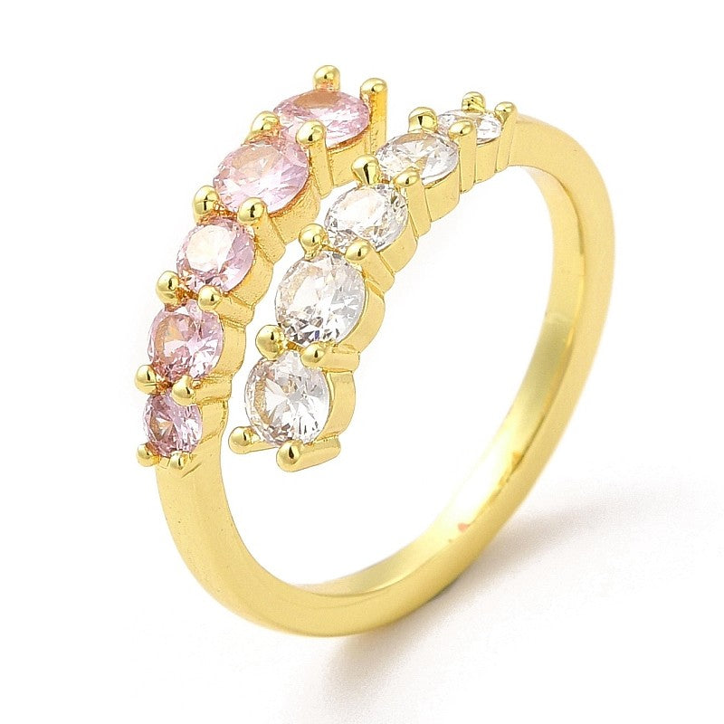 Anillo de mujer ajustable forrado con diamantes CZ rosas y blancos.