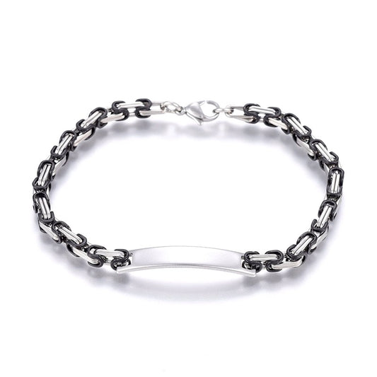 Two-tone black and silver stainless steel curb bracelet