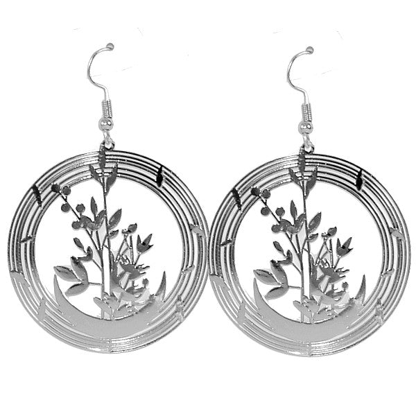 Boucles d'oreilles fantaisie rond avec fleurs argentées